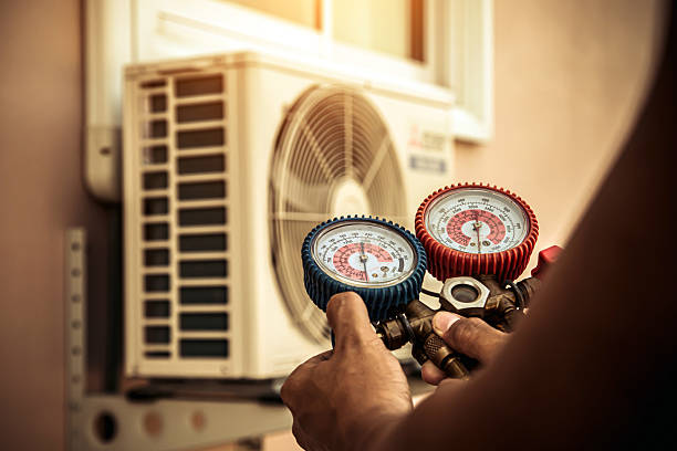 Professional Air Conditioning Service technician working in Woodstock Valley, CT